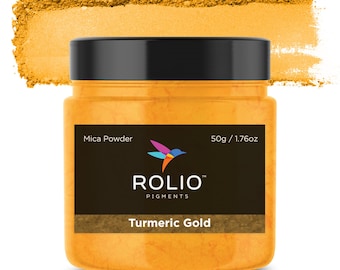 May include: A round jar of Turmeric Gold mica powder by Rolio Pigments. The jar is labeled with the product name, weight (50g / 1.76oz), and the words "Mica Powder".
