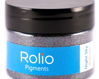 May include: A small jar of black glitter with a blue label that says "Rolio Pigments" and "Night Sky #181000".