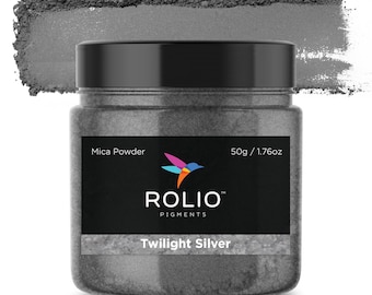 May include: A jar of Twilight Silver mica powder by Rolio Pigments. The jar is black with a white label that says "Mica Powder", "50g / 1.76oz", "Rolio Pigments", and "Twilight Silver".