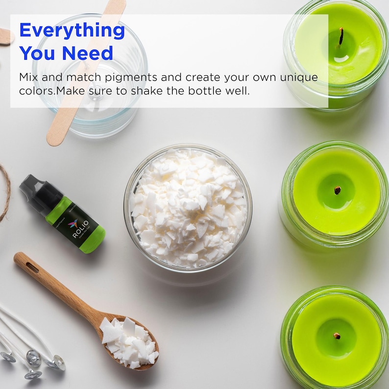May include: A white bowl filled with white wax flakes, a green bottle of candle dye, a wooden spoon with wax flakes, and three green candles. The text "Everything You Need" is at the top of the image. The text "Mix and match pigments and create your own unique colors. Make sure to shake the bottle well." is below the title.