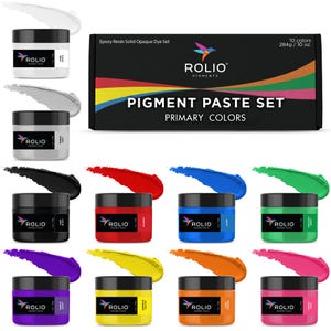 May include: A set of ten primary color pigment pastes in small jars, with a black box labeled "Pigment Paste Set" and "Primary Colors." Each jar has a color swatch next to it, including white, black, red, blue, green, purple, yellow, orange, and pink.