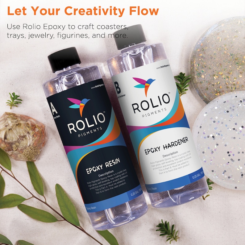 May include: Two clear bottles of Rolio Pigments Epoxy Resin and Epoxy Hardener. The bottles are labeled with the product name, description, and instructions. The bottles are 0.25 gallons each.