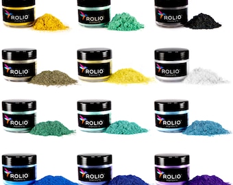 May include: Twelve small jars of pigment powder in various colors, including yellow, green, blue, purple, and white. Each jar has a black lid and a label that says "ROLIO PIGMENTS".