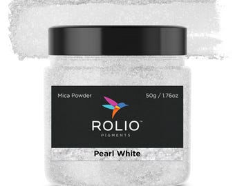 May include: A jar of Pearl White mica powder with a black lid. The label reads "Mica Powder" and "ROLIO PIGMENTS". The jar contains 1.76oz of powder. A swatch of the powder is above the jar.