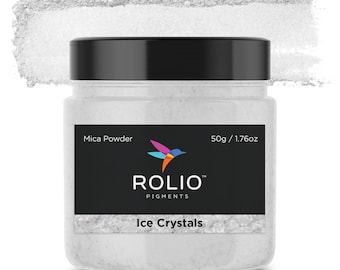 May include: A white mica powder in a clear jar with a black label. The label says "Rolio Pigments" and "Ice Crystals". The jar contains 50g / 1.76oz of mica powder.