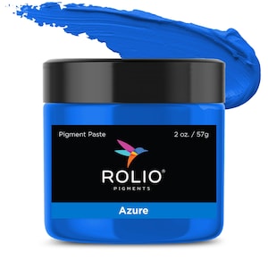 May include: A 2 ounce jar of Rolio Pigments Azure pigment paste. The jar is blue and has a black label with a hummingbird logo and the text "Pigment Paste", "Rolio Pigments", and "Azure".