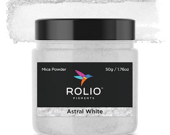 May include: A white mica powder in a round jar with a black lid. The label says "Rolio Pigments Astral White" and "Mica Powder 50g / 1.76oz".