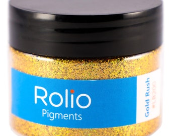 May include: A jar of gold glitter labelled "Rolio Pigments Gold Rush #BZ00".