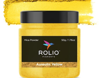 May include: A round jar of Aureolin Yellow mica powder, labeled "Rolio Pigments" with a hummingbird logo. The jar contains 50g / 1.76oz of powder.