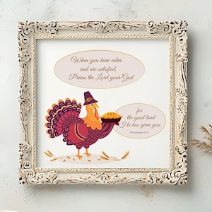 May include: Framed print with a Thanksgiving theme, showing a cartoon turkey in a pilgrim hat holding a pie. The text reads "When you have eaten and are satisfied, Praise the Lord your God" and "for the good land He has given you."