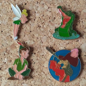Vintage Disney pins from Peter Pan: Peter Pan, Tinker Bell, Captain Hook, Tick-Tock the Crocodile pins from the Walt Disney movie