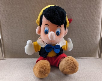 Vintage Tokyo Disneyland Pinocchio plush: Pinocchio sitting stuffed doll