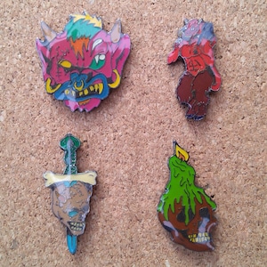 Vintage skulls and demons pins: Demon face, satyr demon, skull sword and skull candle enamel pins