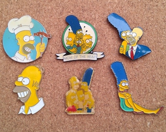 Vintage "The Simpsons" Homer & Marge Simpson pins: Chef Homer, Mom of the year, Simpsons family and Marge sitting enamel pins