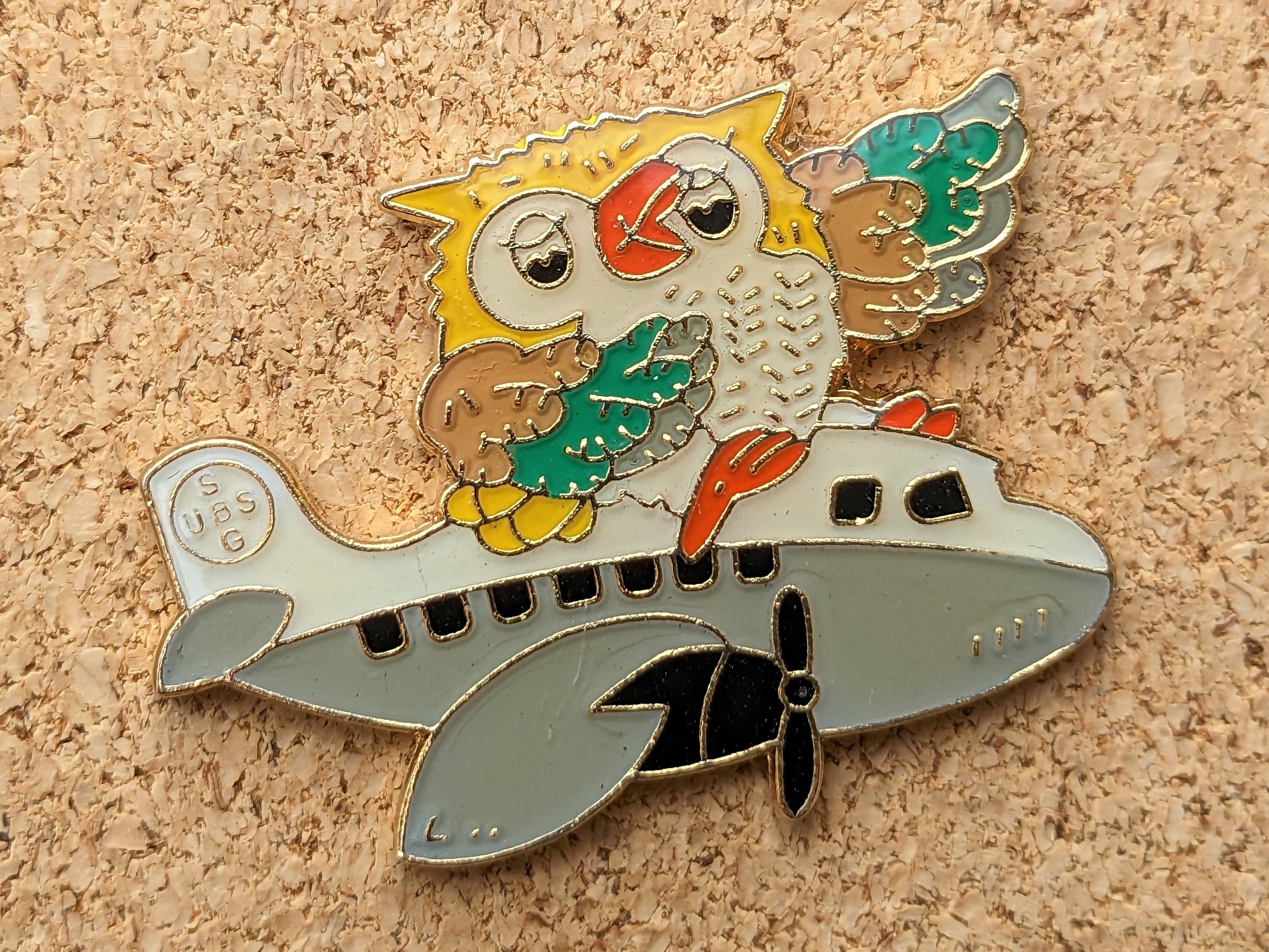 Vintage Owl riding an airplane enamel pin