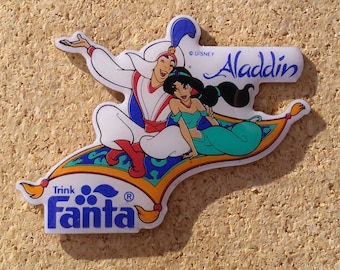 Vintage Aladdin Fanta promotie pin: Aladdin en Jasmine op de magische tapijt emaille pin