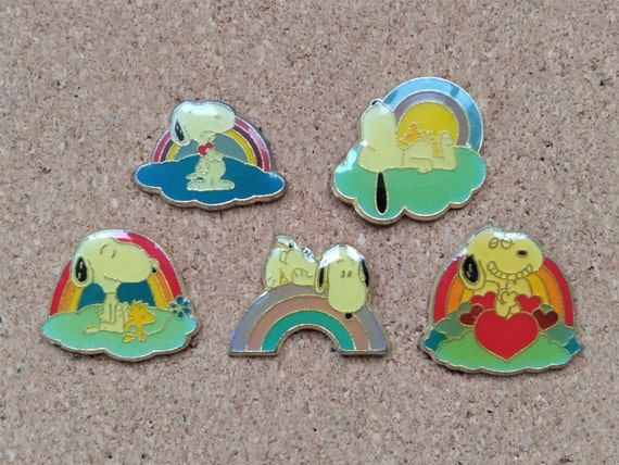 Vintage "Peanuts" pins: Snoopy and Woodstock rain… - image 1