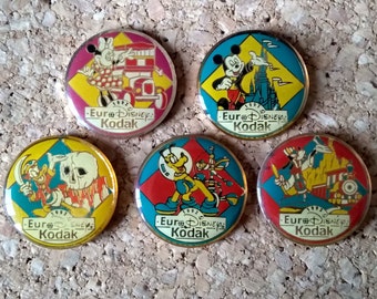 Vintage Disney Kodak pins from 1992: Mickey Mouse, Goofy, Minnie Mouse, Pluto, Donald Duck pins in commemoration of Euro Disneyland Paris