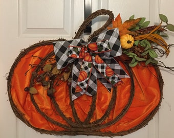 Pumpkin door hanger with bow, fall embellishments