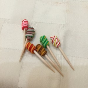 Rainbow Swirl Unicorn Lollipops