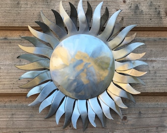 Handmade metal shiny Sun for wall mounting. Indoor & Outdoor metal boho wall art made by blacksmith. Beautiful gift ideas.