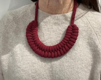 Deep red woven rope necklace, made from chunky recycled cotton cord with a magnetic fasten