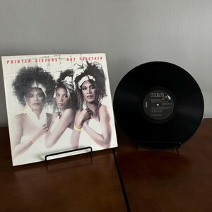 May include: A vinyl record album cover featuring a photo of three women, the Pointer Sisters, with the album title "Not Together".