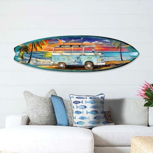 May include: A colorful surfboard with a vintage van driving on a beach with palm trees and a sunset in the background.