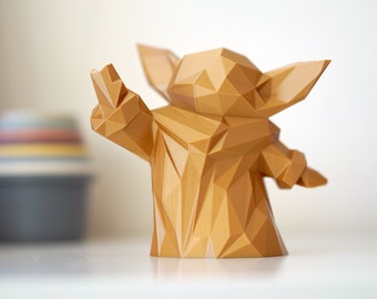 Low poly geometric Grogu figure