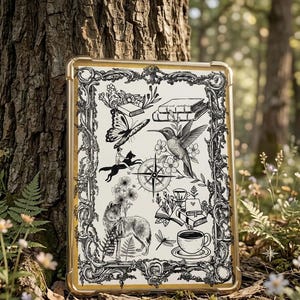 May include: A tablet case with a gold-coloured frame and a cream interior. It features a black and white illustration of a butterfly, hummingbird, wolf, books, compass, and coffee cup. The case is set against a natural forest backdrop.