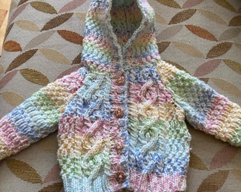 Handknitted Aran cardigans for babies and toddlers