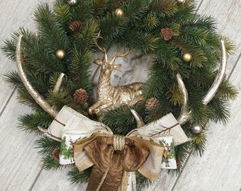 Christmas wreath with golden deer