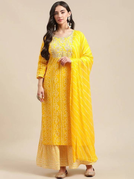 Yellow kurti with store white sharara