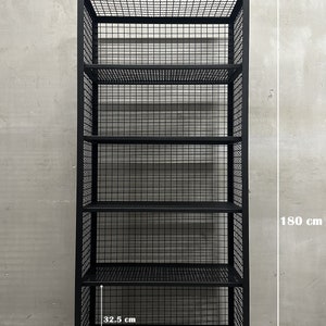 May include: Black metal shelving unit with six wire mesh shelves. The unit is 73 cm wide, 40 cm deep, and 180 cm tall. The shelves are 32.5 cm deep. The brand name "METALFUN" is displayed at the top.