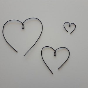 trio of wire hearts, wall decoration, love, stylized,