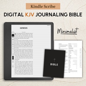 May include: A digital Kindle Scribe e-reader displaying the first chapter of Genesis from the King James Version (KJV) of the Bible. The screen shows the text in a minimalist, easy-to-read font. The e-reader is on a white, sandy surface. A small black book with a cross and the word "BIBLE" is in the foreground. A black and white sheet of paper with a list of books from the New Testament is in the background. The text "Minimalist" is written in black cursive on the image.