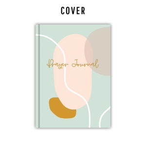 Pode incluir: Uma capa verde claro para um di&aacute;rio de ora&ccedil;&atilde;o com as palavras "Prayer Journal" em letras douradas. A capa apresenta formas abstratas em rosa, marrom e amarelo.