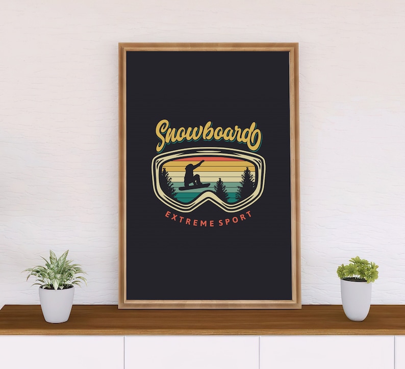 May include: A vintage-style poster with a snowboarder silhouette in a pair of goggles. The goggles have a retro sunset design with a mountain scene. The text "Snowboardo Extreme Sport" is printed below the goggles.