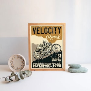 May include: A vintage-style poster advertising a motorcycle race called "Velocity Races". The poster features a black and white illustration of a motorcycle rider speeding up a hill. The text on the poster reads "Velocity Races", "Friday August 2nd", "Mississippi Valley Fairgrounds", and "Davenport, Iowa".