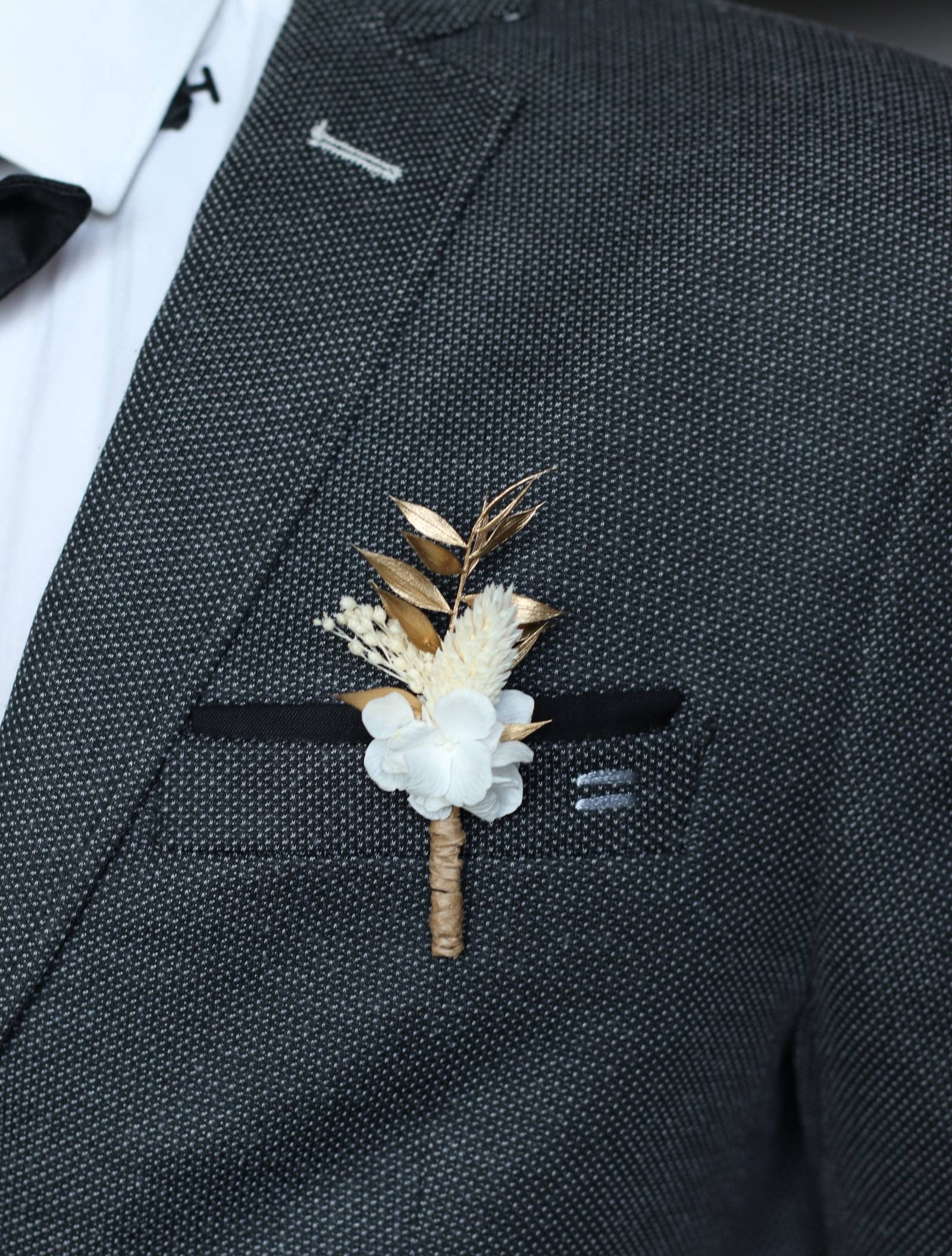 Yanis buttonhole in dried and stabilized natural flowers for groom an…