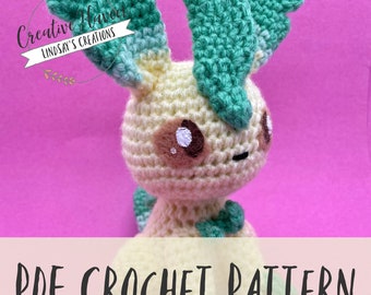 May include: A crochet pattern for a light green and yellow Eevee Pokemon amigurumi. The pattern is available as a PDF download. The image shows the finished crochet Eevee.