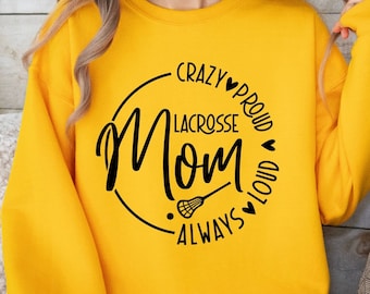 May include: Yellow sweatshirt with a black circle design that says "Crazy Lacrosse Mom Always Proud and Loud".