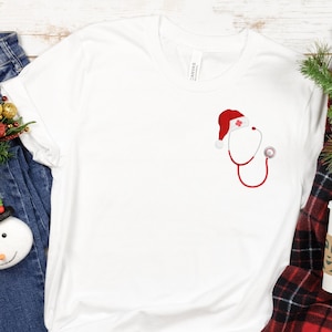 Stethoscope with Santa Hat Pocket, Christmas Shirt for Nurse, Nurse Christmas Shirt, Funny Christmas Gifts, Cute Christmas Shirt for Women