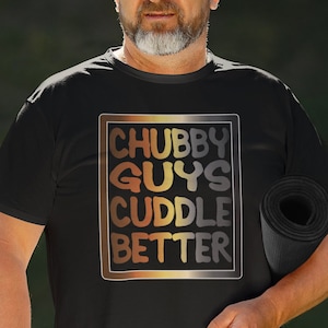 May include: A black t-shirt with a rainbow colored graphic that says "Chubby Guys Cuddle Better".