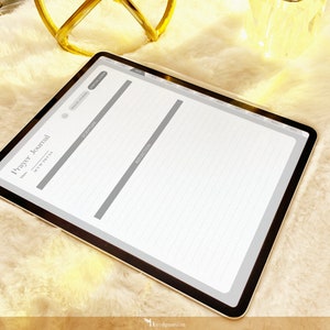 May include: A digital tablet displaying a printable prayer journal template with sections for date, scripture, prayer, and reflection. The template has a gray background and white lines.