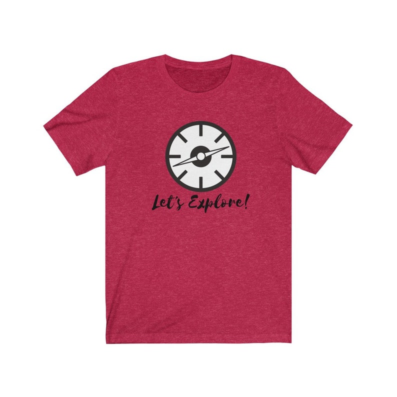 May include: Red short-sleeved t-shirt with a black and white compass graphic and the text "Let's Explore!"