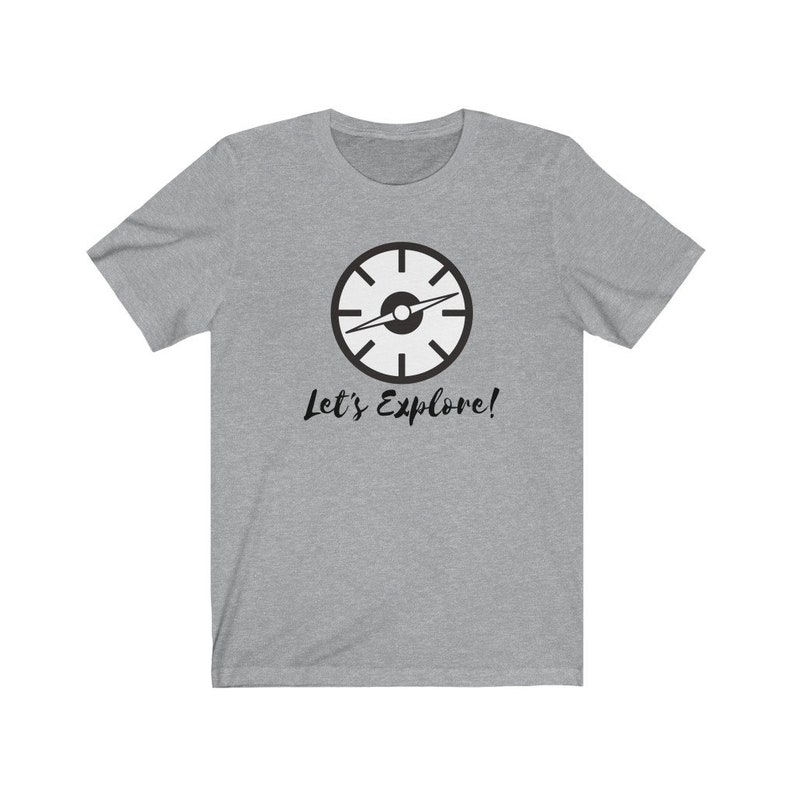 May include: A heather grey t-shirt with a black compass graphic and the text "Let's Explore!"