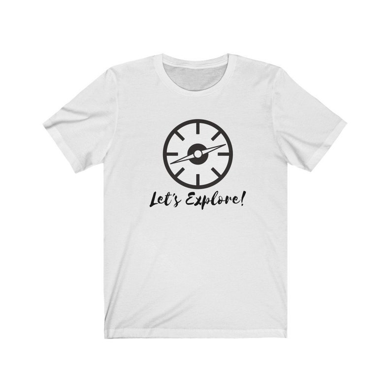 May include: White t-shirt with a black compass graphic and the text "Let's Explore!"