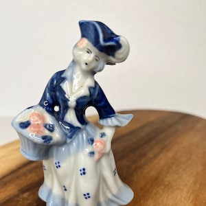 Made in Occupied Japan Blue and White Japanese Woman Figure in Colonial Dress, Vintage Figure of woman carrying flower basket