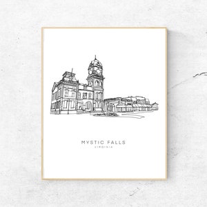 May include: A framed black and white line drawing of a building with a clock tower. The text "MYSTIC FALLS VIRGINIA" is printed below the building. The artwork is displayed on a white wall.